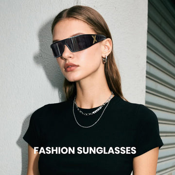 Woman wearing black sunglasses with a plain background